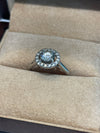 18 Carat White Gold Diamond Solitaire and Halo ring