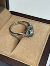 18 Carat White Gold Diamond Solitaire and Halo ring
