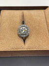 18 Carat White Gold Diamond Solitaire and Halo ring