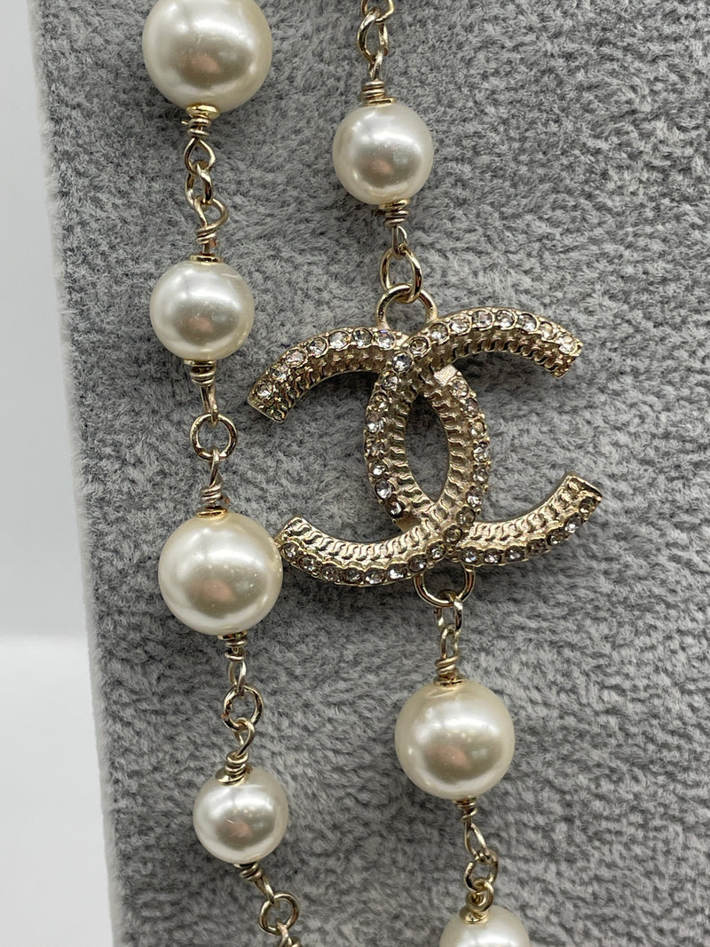 Chanel Double Length Pearl Necklace With Interlocking C Logo Elite chanel-double-length-pearl-necklace-with-interlocking-c-logo-elite
