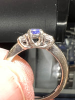 A Beautiful diamond and tanzanite three stone ring
