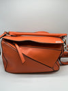Lowe Orange Puzzle Bag