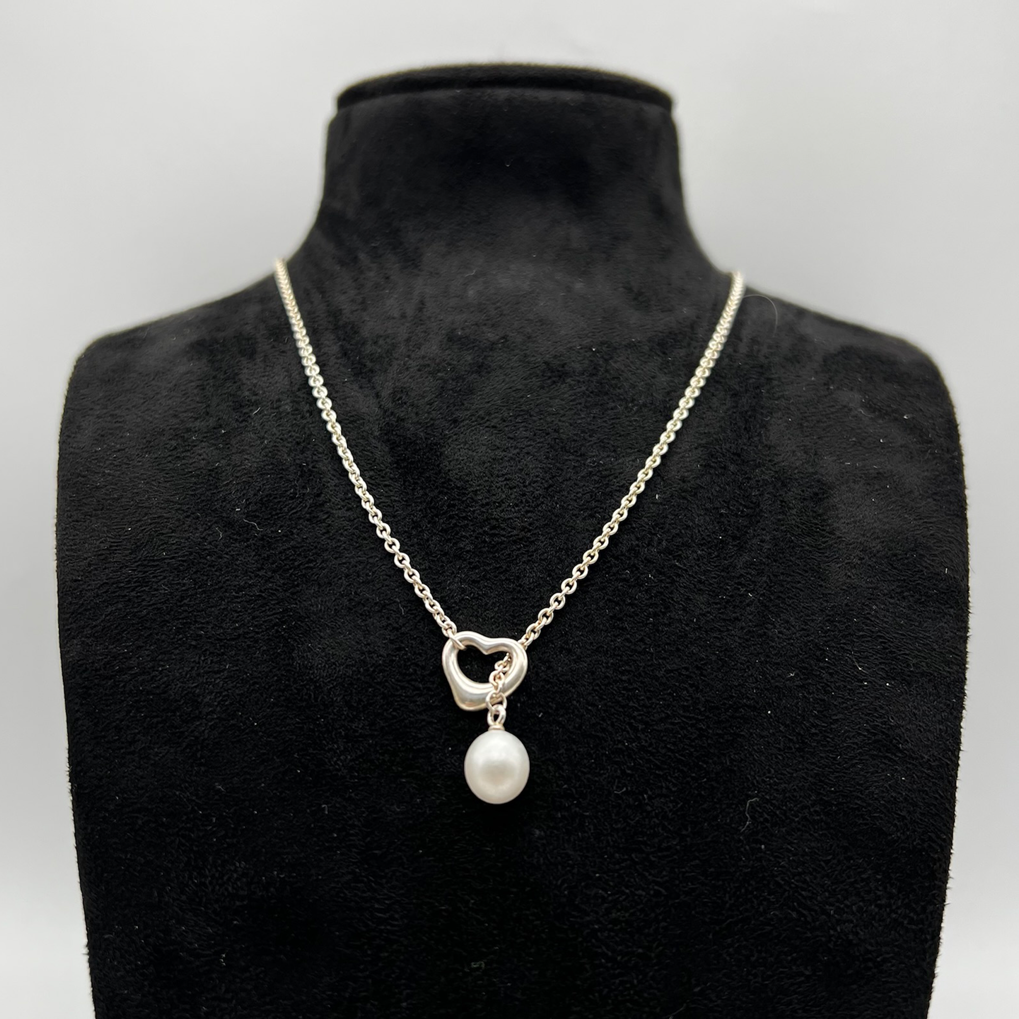 Elsa Peretti Tiffany & Co. 18 Karat Gold Open Heart Pendant Necklace |  Wilson's Estate Jewelry