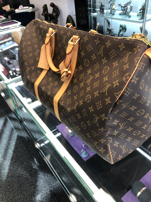 LOUIS VUITTON LEATHER CARRY BAG